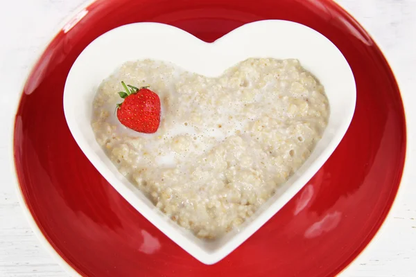 Healthy breakfast  of strawberry porridge or oatmeal. — Stock Photo, Image