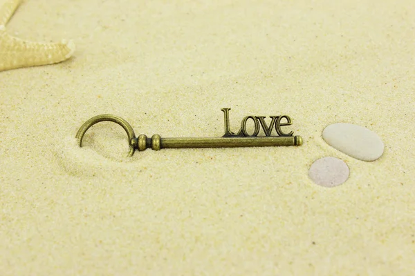 Clave para el amor en una playa — Foto de Stock