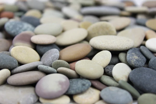 Colored Beach stones or pebbles close up. Stock Picture