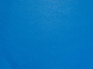 Pürüzsüz bir yüzeyi olan koyu mavi bir doku arkaplanı.