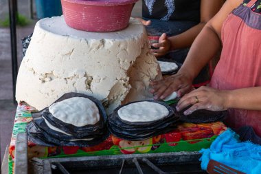Authentic Corn Tortilla Preparation with Handcrafting Process in Traditional Salvadoran Cuisine
