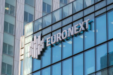 Courbevoie, France - November 12, 2020: Exterior view of the Euronext building in the business district of Paris La Dfense. Euronext is the largest stock exchange in Europe clipart