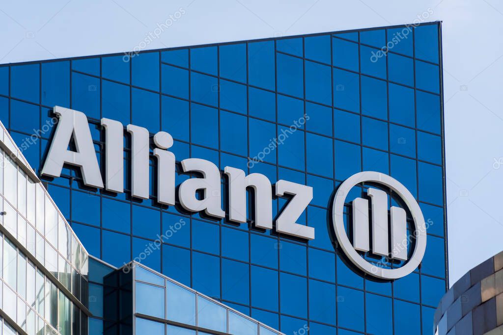 Puteaux, France - November 12, 2020: Logo at the top of the Allianz One tower, French headquarters of Allianz insurance company, located in the business district of Paris La Dfense