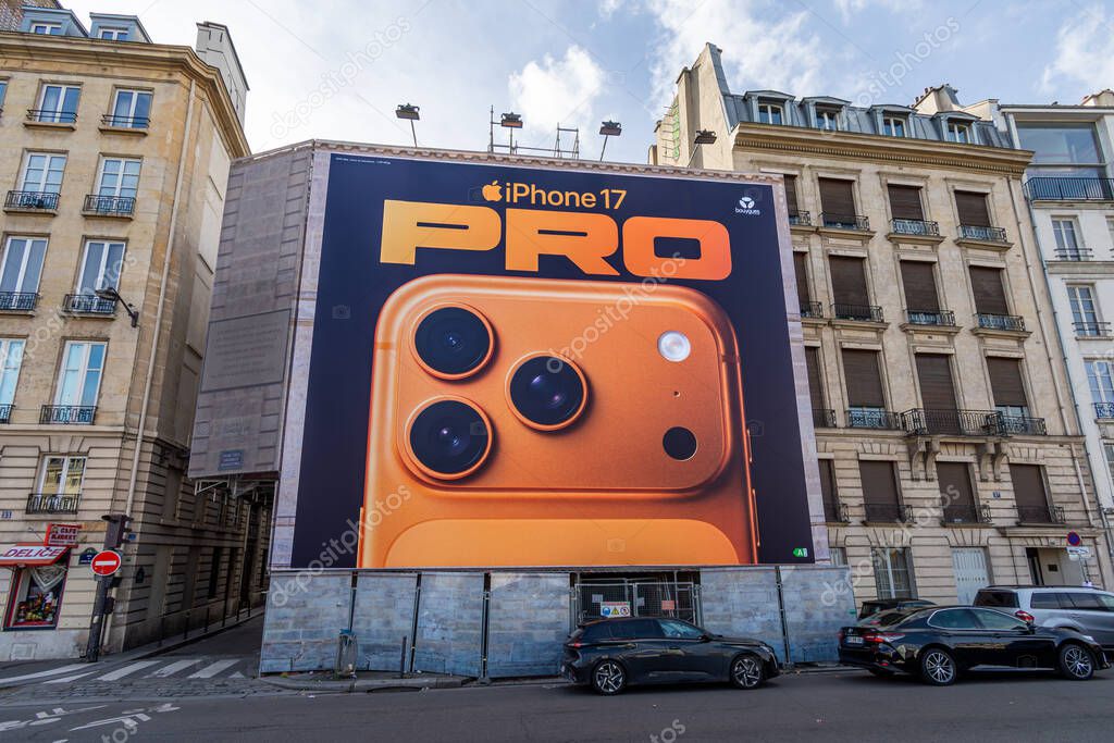 Paris, France - October 30, 2025: Large advertising billboard for the new Apple iPhone 17 Pro smartphone covering the scaffolding of restoration work on the facade of a Parisian building