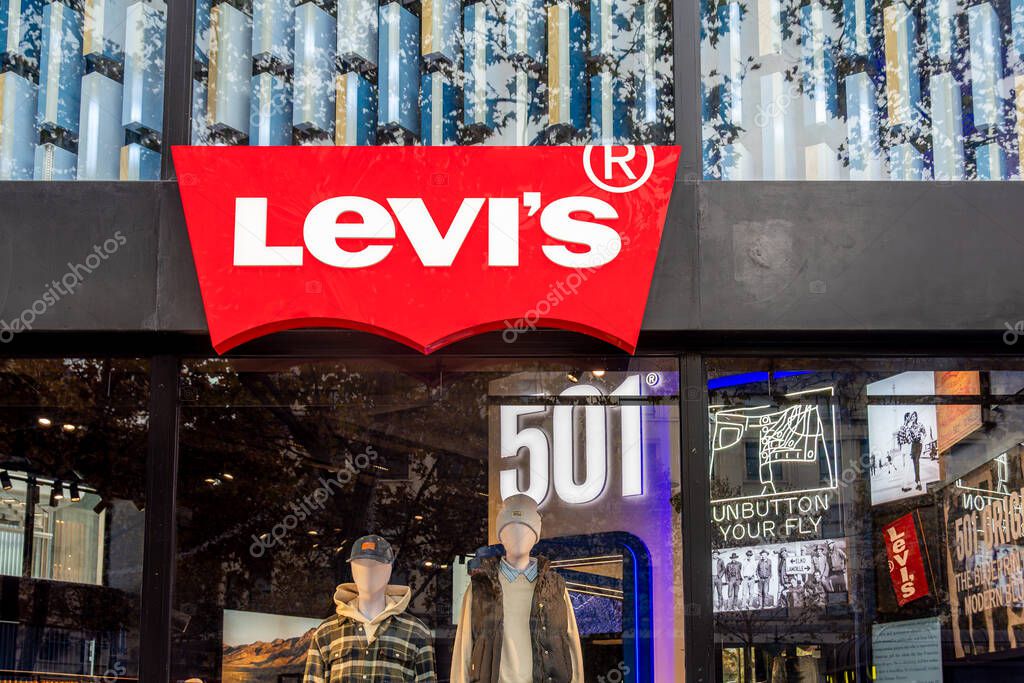 Paris, France - November 3, 2025: Store window of a Levi's boutique. Levi Strauss and Co. is an American brand and chain of fashion stores world famous for its denim blue jeans