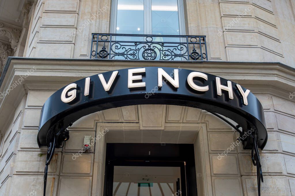 Paris, France - November 3, 2025: Sign at the entrance to a Givenchy store in the Champs-Elysees district of Paris, France. Givenchy is a French luxury brand belonging to the LVMH group