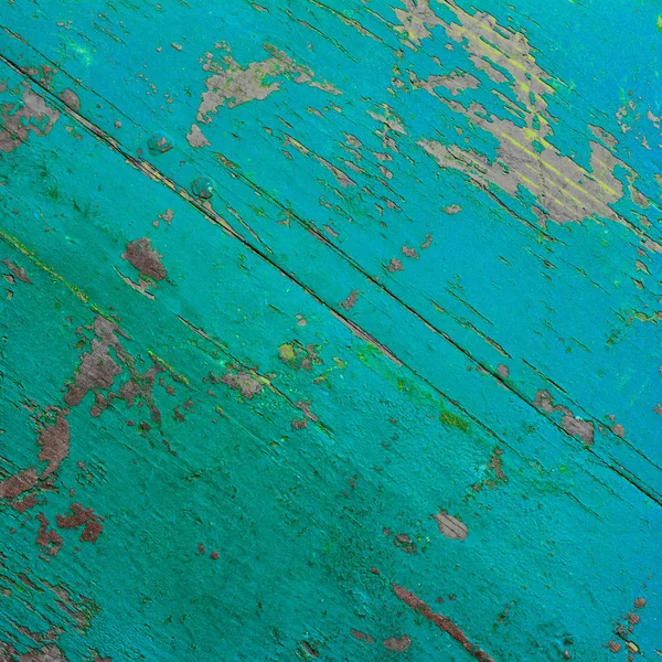 Background texture of the old ultra turquoise painted board in the cracks. square photo with copy space for text — Stock Photo, Image