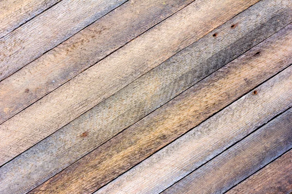 Background texture old gray barn board with diagonal wooden slats. toned photo — Stock Photo, Image