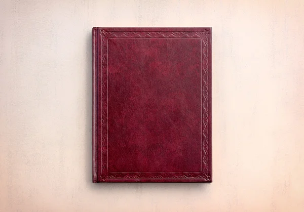 Livro vermelho sobre um fundo rosa, vista superior. foto matizado — Fotografia de Stock