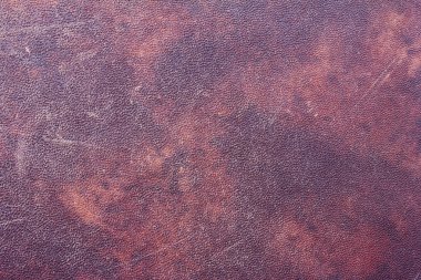 Kırmızı deri dokusuna. Metin için özgür yer. Kopya alanı