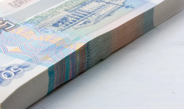 The national currency of Russia. a stack of new paper money. shallow depth of field — Stock Photo, Image