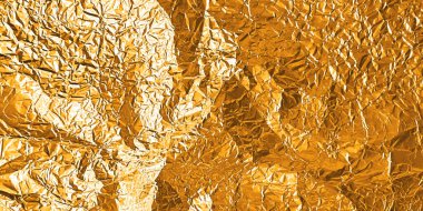 Parlak buruşuk yüzeyi olan altın folyo dokusu. Kırışık kağıt desenli altın metalik arka plan. Sert kıvrımlı parlak bronz bir malzeme ve kaliteli zarif bir tasarım için lüks bir parıltı..
