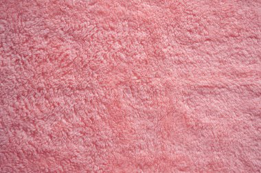 Luxuriors havlu kumaşı ya da ipek soyut arka plan. Renkli pembe dağınık kürk kumaş dokusu ve deseni, üst görünüm veya düz yatar metin için boşluk.