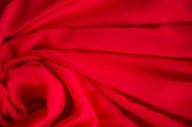 Arka plan için kırmızı kumaş veya lüks ipek saten.