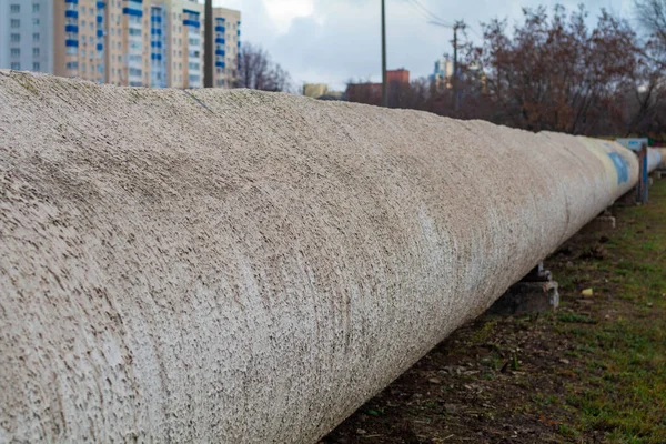 Outdoor pipe of a heating main in an industrial area