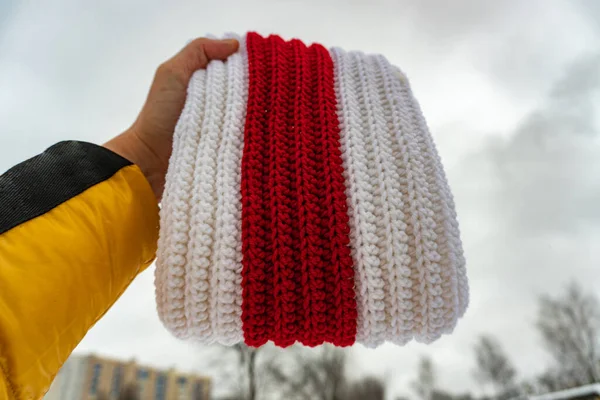 White-red-white scarf and craft box on white background