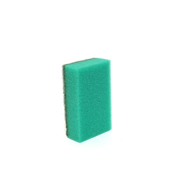 Groene spons voor de afwas geïsoleerd op witte achtergrond — Stockfoto