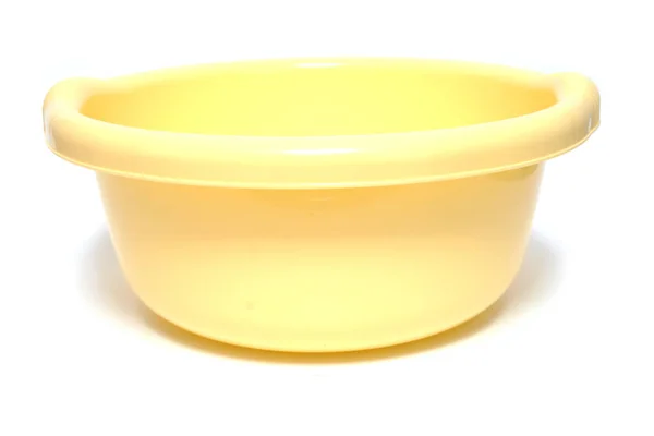 Yellow plastic bowl isolated on white background — Stock Photo, Image