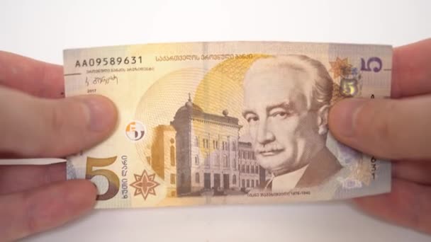 5 Lari georgiano em mãos, dinheiro georgiano, banco de georgia — Vídeo de Stock