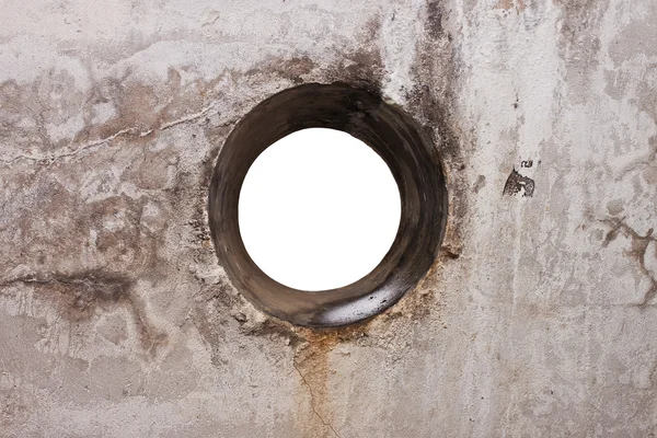 Okrągły otwór w ścianie betonowej — Zdjęcie stockowe