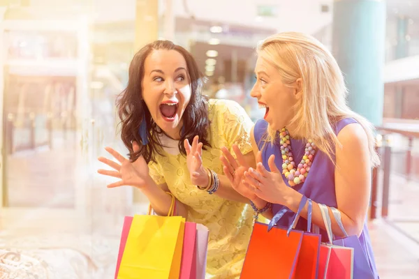 Excited friends at the shopping mall — Stock Photo, Image