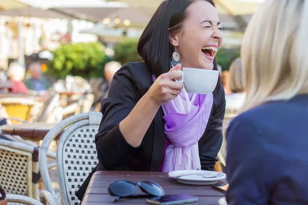 Two female friends having good time together — Stock Photo, Image