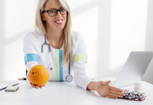 Nutritionist female doctor offers healthy alternative to medicines