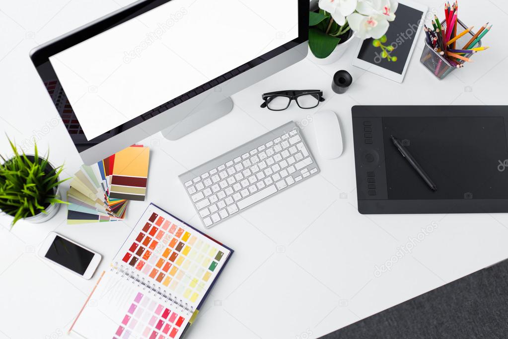 Creative professional designer's desk from above