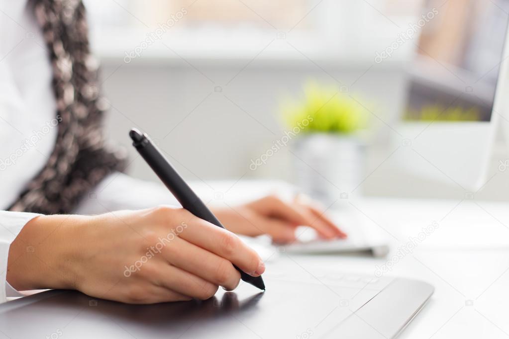 Designer using graphics tablet