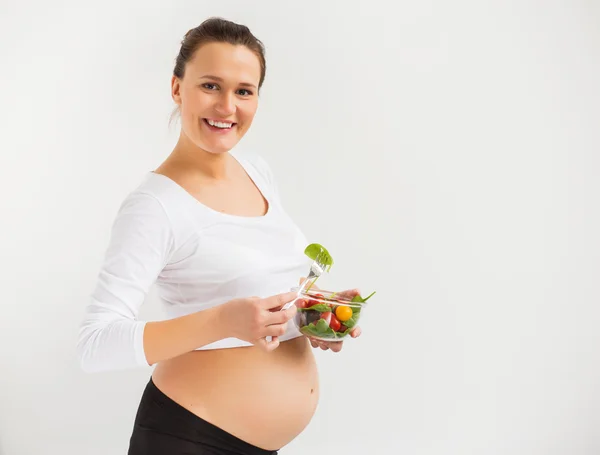 怀孕妇女吃东西 — 图库照片