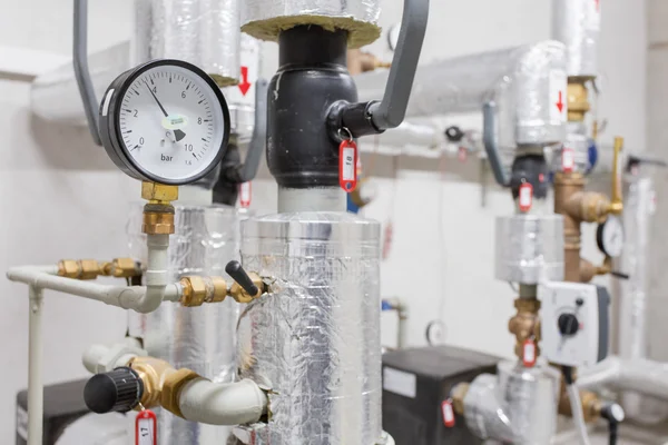 Manometer and pipelines of heating system — Stock Image Manometer and pipelines of heating system Stock Picture