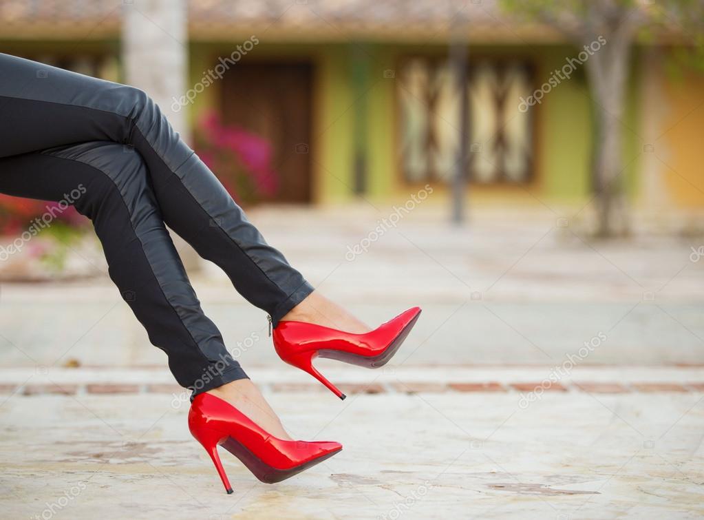 Female legs in jeans black high heels beauty pain on white background  isolation Stock Photo | Adobe Stock