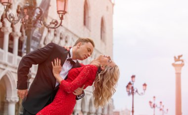 Romantic couple dancing on the street in Venice