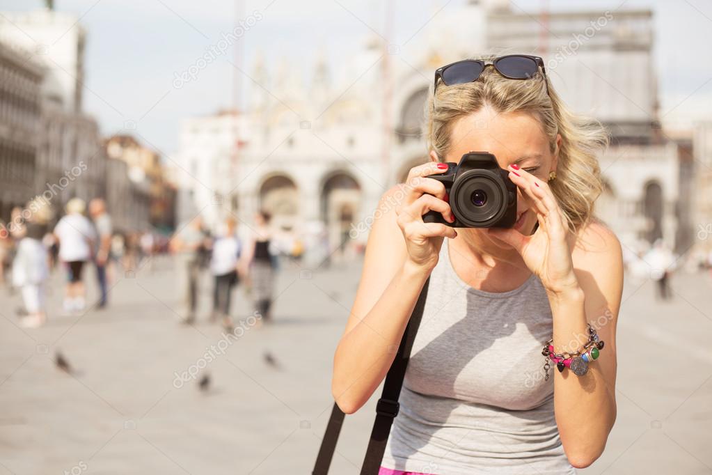 Tourist taking photos in Venice