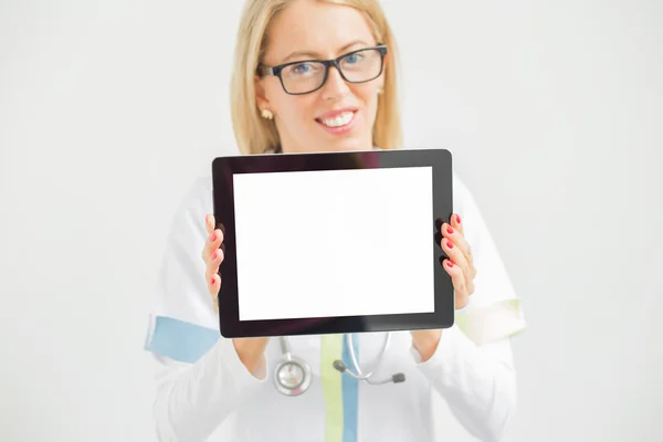 Happy doctor with tablet — Stock Photo, Image