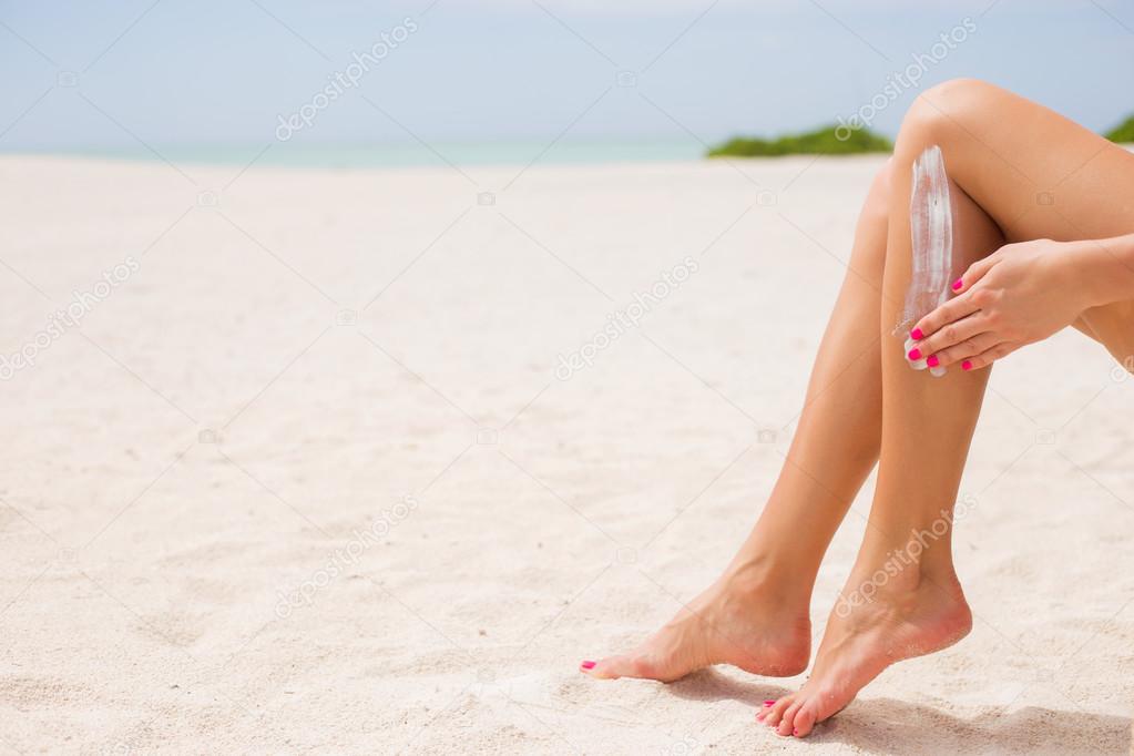 Woman sunbathing on the beach