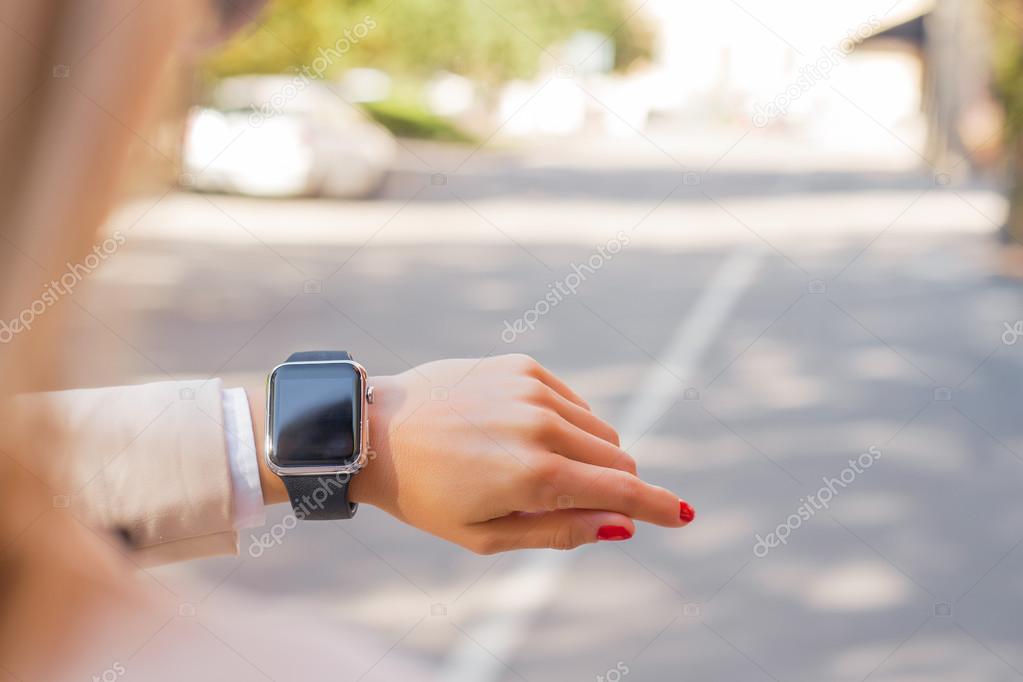 Woman with digital watch