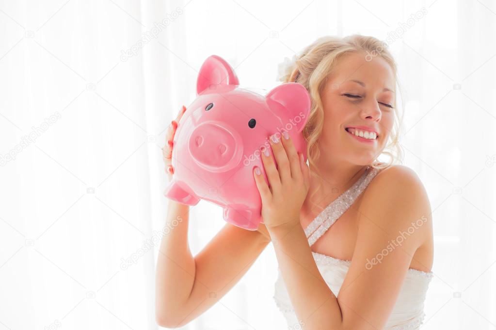 Bride with piggy bank