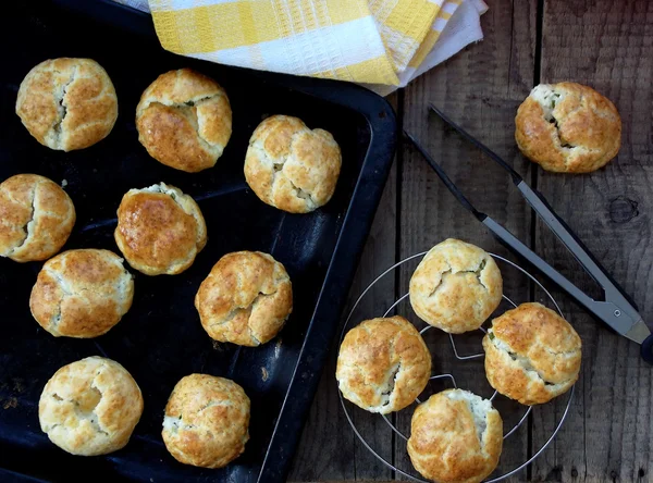 Buns with cheese and herbs in a pan or — Stock Photo, Image