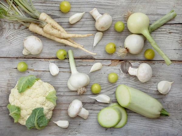 White vegetables on wooden background — Stock Photo, Image