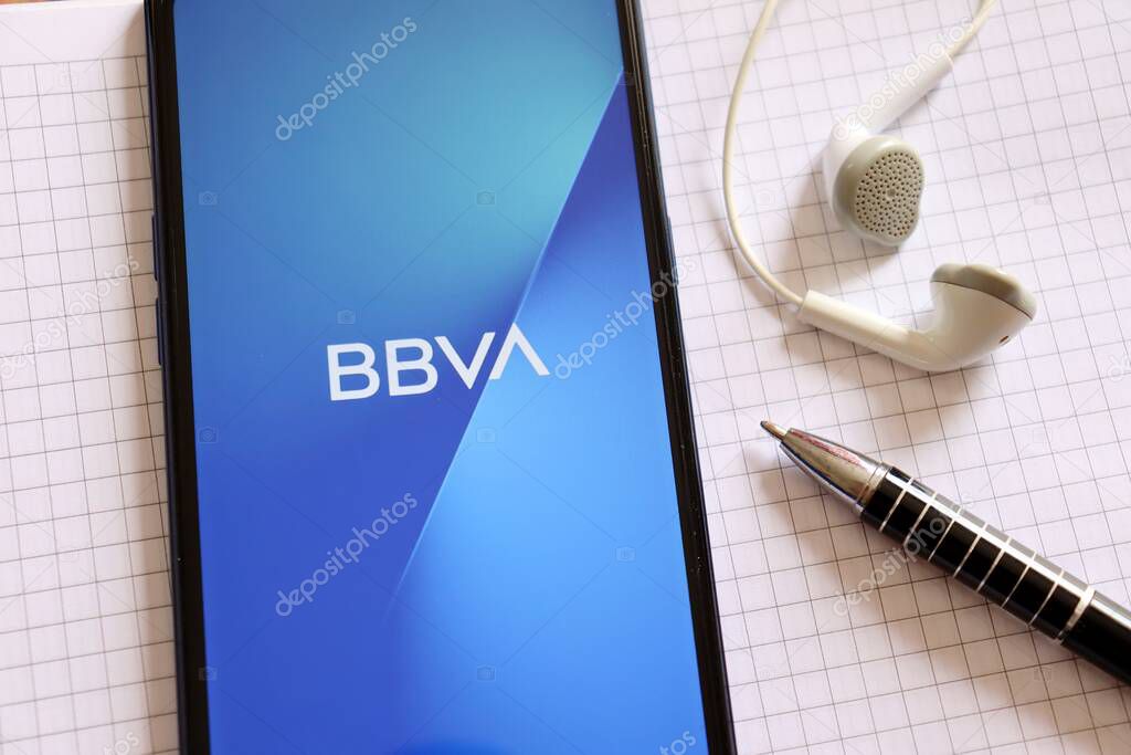 Bahia, Brazil - February 24, 2021: BBVA Bank App on smartphone screen on office desk. Multinational Spanish banking group. Financial services.