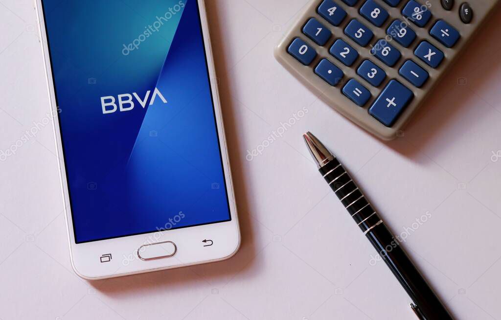 Bahia, Brazil - September 17, 2020. BBVA Bank App on smartphone screen on office desk. Multinational Spanish banking group. Financial services.