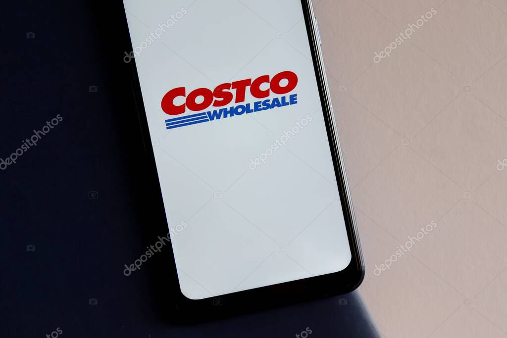 Brazil - October 22, 2020: Costco logo on smartphone screen. Costco Wholesale Corporation is an American multinational corporation.