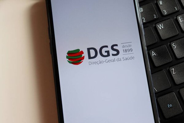 Bahia, Brazil - February 10, 2021. Direcao-Geral da Saude (The Directorate-General of Health - DGS) logo on smartphone screen. Concept of Covid-19 in Portugal.
