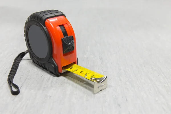 Red and black tape measure. — Stock Photo, Image