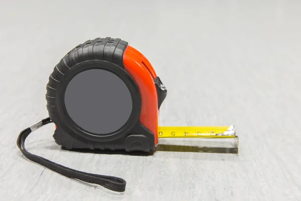 Red and black tape measure. — Stock Photo, Image