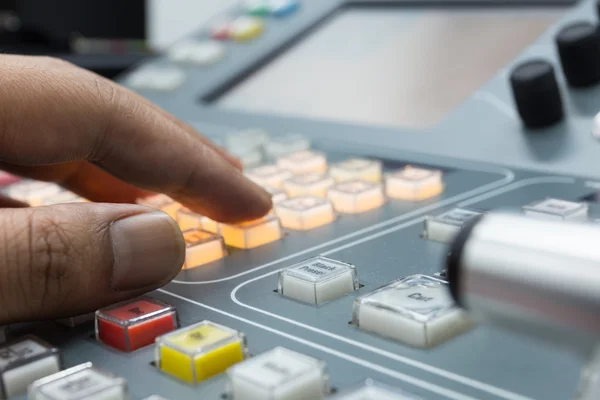 Hands of a cinematographer who worked on the vision mixer, switch the TV panel to the gallery. — Stock Photo, Image