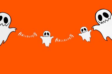 Cadılar Bayramı geçmişi. Turuncu arka planda. Hellwin mücevherleri. Harf