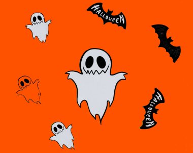 Cadılar Bayramı geçmişi. Turuncu arka planda. Hellwin mücevherleri. Harf