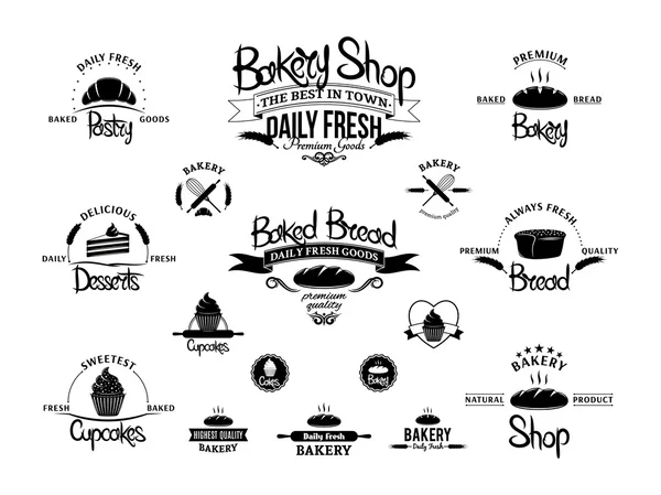 Set of vintage black and white bakery emblems, labels and designed elements — Stock Vector